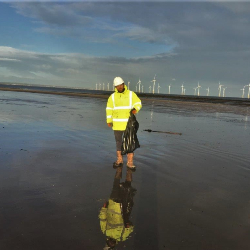 Construction team conducts beach clean at seafront in Redcar